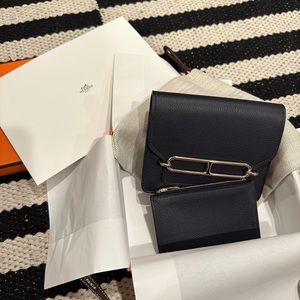 Brand new and never used Hermes Roulis Slim Wallet in Bleu Nuit